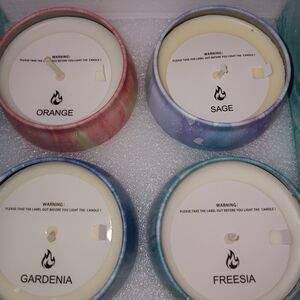 Set of Four Scented Candles in Colorful Tins